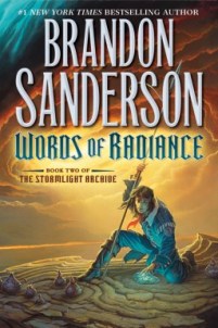 A mean with a spear crouching in rocky terrain, a storm behind him. The text reads "#1 New York Times Bestselling Author, Brandon Sanderson, Words of Radiance, Book Two of The Stormlight Archive."